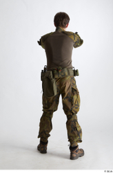 Whole Body Weapons-Pistol Man Pose with pistol White Uniform Athletic Studio photo references